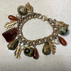 1950s Gold Charm Bracelet with Amber resin, Green wood beads and gold tone leaf